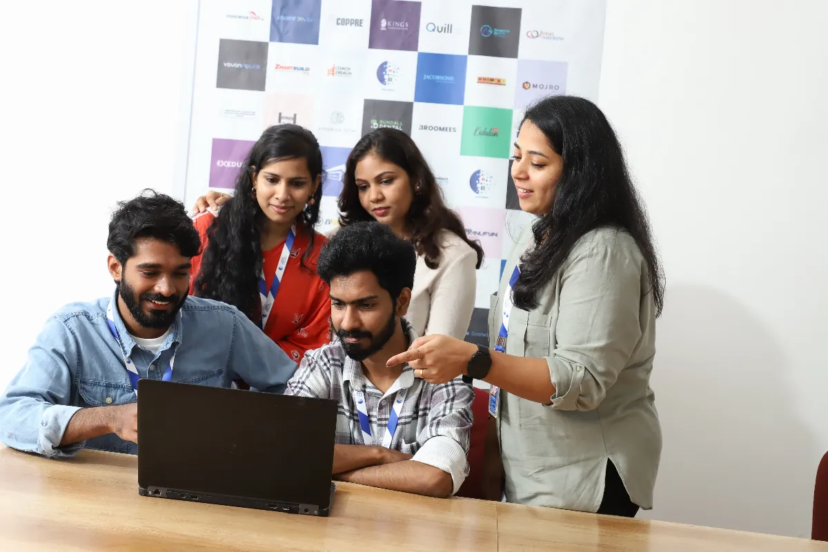 Campaign review session around a laptop